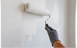 Primer application on a prepared interior surface